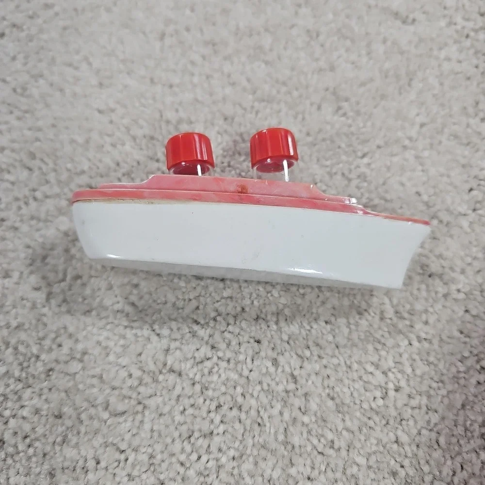 Vintage‎ Plastic Yacht Ship Holding Set Of Salt and Pepper Shakers Red/White